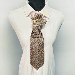 Chic Herringbone Necktie with Gold Queen Brooch